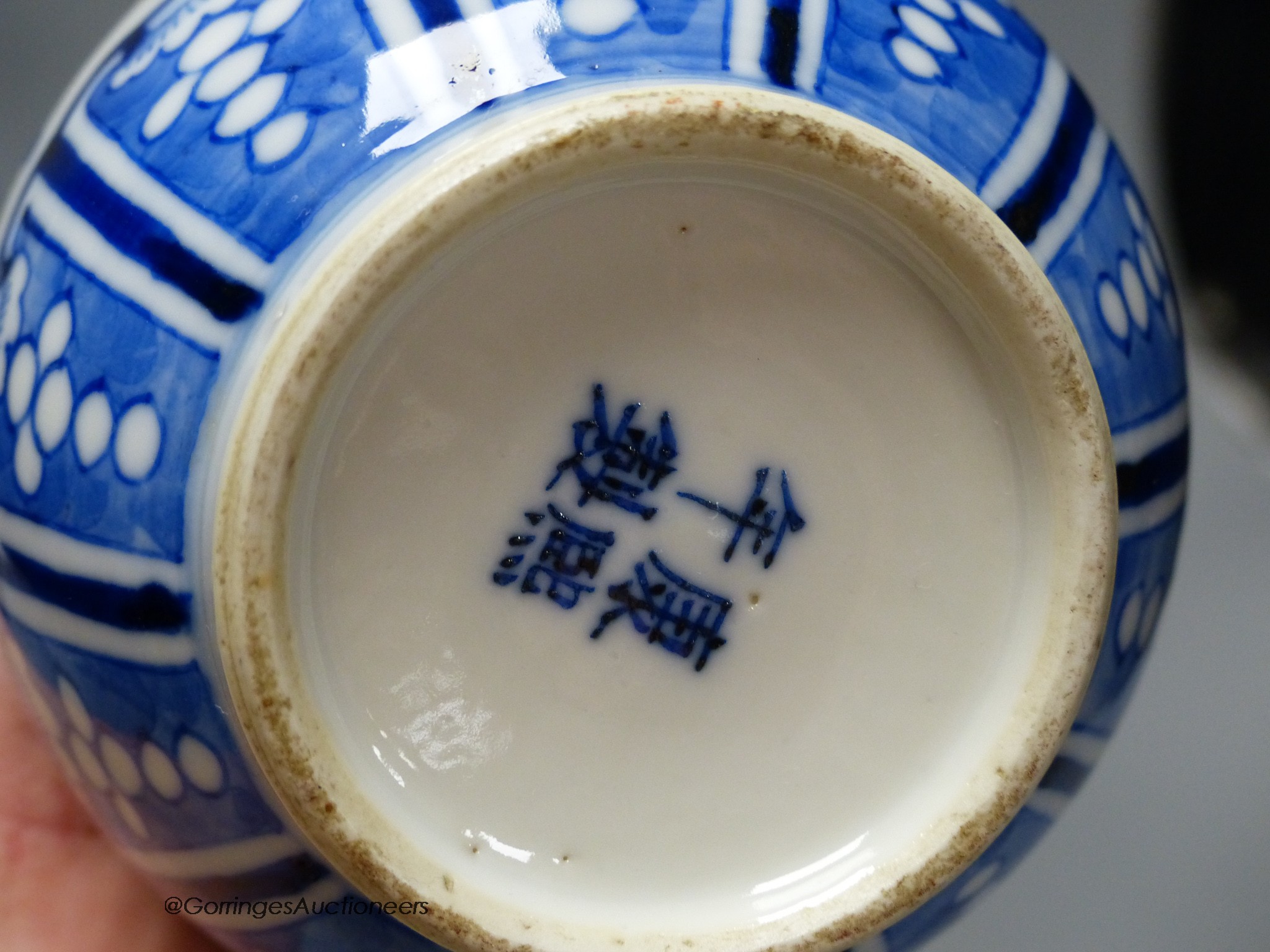 A pair of Chinese blue and white 'dragon' bottle vases, a prunus jar and cover, all late 19th century